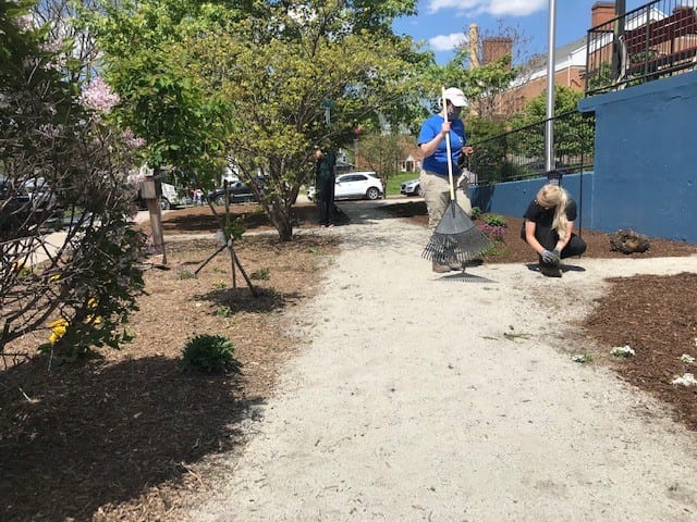 Volunteers Rake Sense Charter School