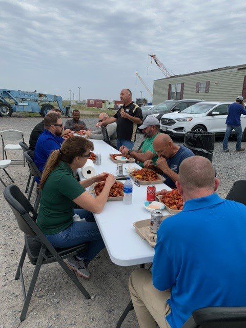 Workers Eating Crawfish After Hurricane Ida